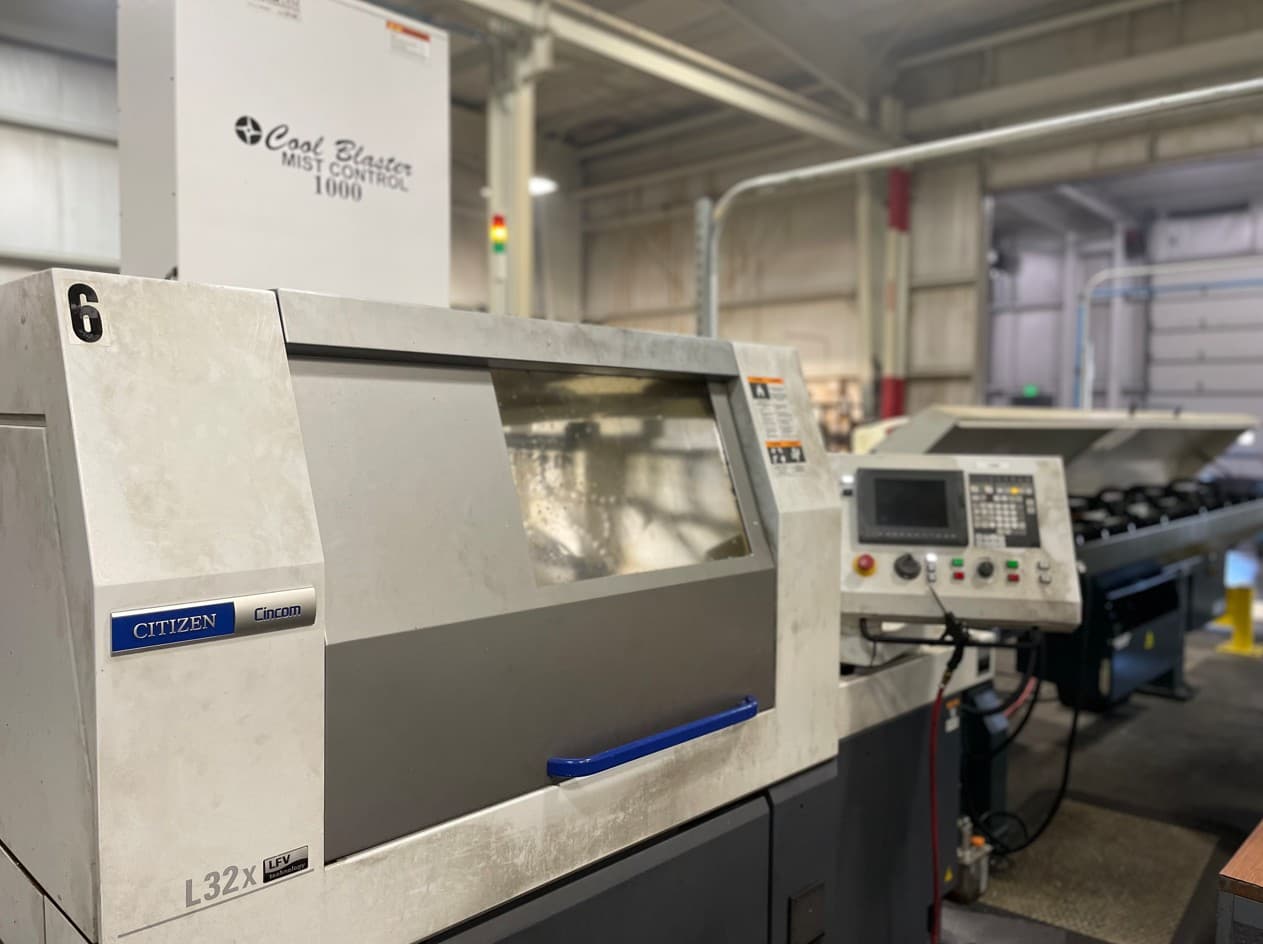 A Swiss machining center used to make custom CNC parts at Coleys.
